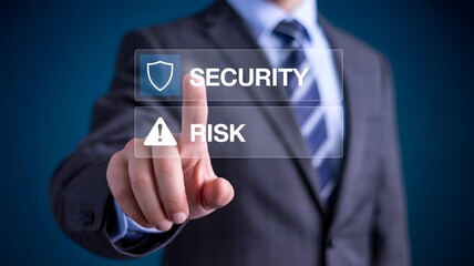 Businessman s finger touches a digital screen interface selecting the security option over risk symbolizing data protection and cybersecurity choices
