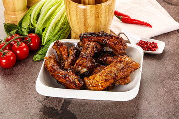 Grilled pork ribs in barbecue sauce
