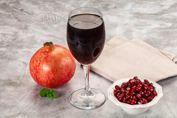Sweet fresh pomegranate juice with fruit