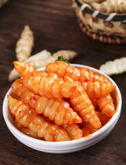 Crispy jade bead cabbage with red oil and fresh ground silkworms served in a bowl
