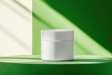 Mockup of white cosmetic jar container on green background with sunlight and shadows. Minimal design concept for skincare and beauty branding.