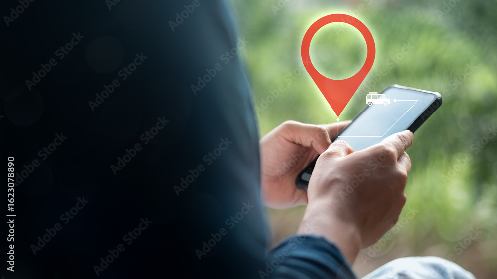 Poster close-up of a hand using a smartphone with a gps location pin and a vehicle tracking icon. concept o