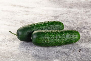 Ripe green raw two cucumbers