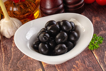Mediterranean marinated Black olives in the bowl