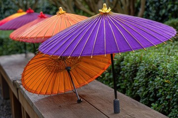 Colorful Japanese parasols on a wooden bench