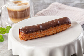 Gourmet chocolate eclair with icing