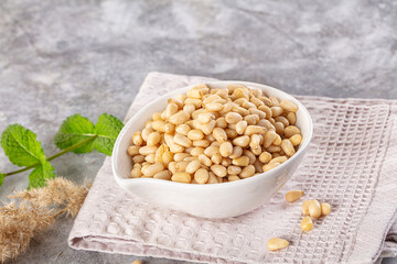 Cedar nut kernel in the bowl