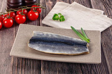 Salted herring fillet with skin