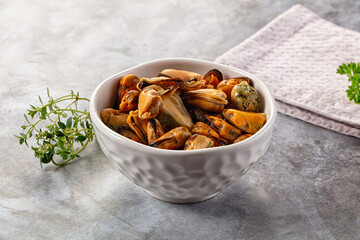 Peeled mussels heap in the bowl