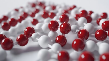 Close-up of a molecular structure with red and white spheres.