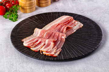 Raw bacon pork meat slices