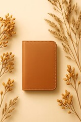 Minimalist Flat Lay Of Tan Leather Notebook With Botanicals