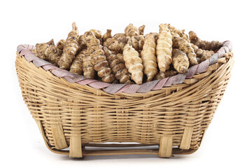 Fresh pagoda cabbage manna seeds displayed in a woven basket ready for planting and culinary use