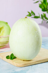 Fresh nanhui shandong jade mushroom melon displayed in a bright setting