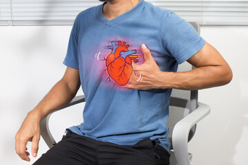 A man clutching his chest with a vivid heart illustration highlights heart attack symptoms and health awareness in a bold, eye-catching graphic photo concept.