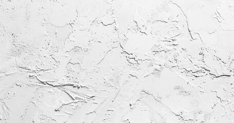 A textured white surface with subtle variations and patterns.