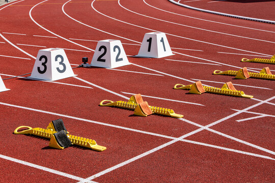 background for athletics with tartan tracks in stadium
