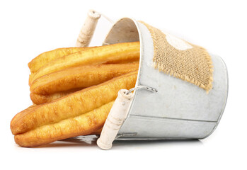 Crispy gourmet small fries served in a rustic bucket creating a delicious snack experience for food...