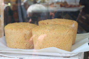 Freshly baked bread displayed in bakery window