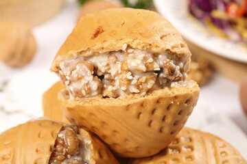 Piping hot walnut buns served during Cantonese morning tea in a traditional setting