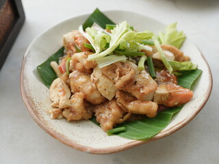 Stir-fried sea bass with celery, ready to serve hot.