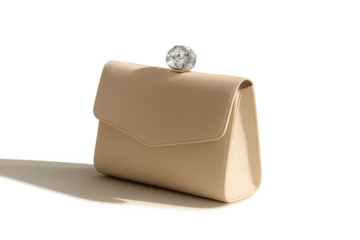 Beige clutch bag with top gem clasp and shadow on transparent background