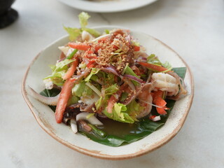 Seafood glass noodle salad with mixed vegetables, a delicious gourmet meal for lunch or dinner