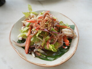 Seafood glass noodle salad with mixed vegetables, a delicious gourmet meal for lunch or dinner