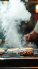 Juicy burger patties sizzling on a grill with buns, emitting aromatic steam.