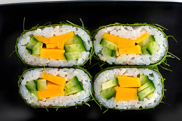 Fresh Vegan Sushi Rolls: Cucumber, Mango, Rice, and Seaweed Food Photography