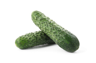 Two fresh green cucumbers isolated on white