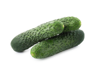 Three fresh green cucumbers isolated on white