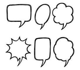 Sketchy style speech bubbles in various shapes arranged on a white surface
