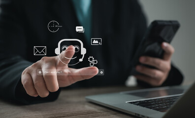 Businessperson interacting with virtual AI chatbot support interface featuring smiling bot icon, message bubbles and assistance prompt, symbolizing automated communication and digital customer service