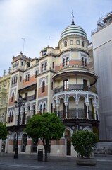 Fototapeta premium Seville, Spain 03.25.2019: View of the historic La Adriatica Building in Seville