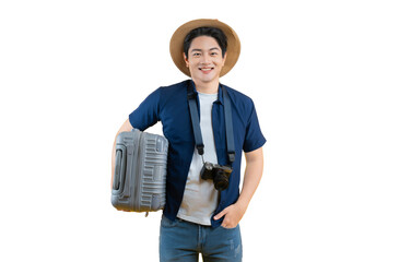 A joyful traveler ready to explore the world, holding a suitcase and wearing a hat, smiles at the...
