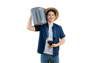 A young man in travel-ready attire, smiling. He is holding a camera and carrying luggage on his...
