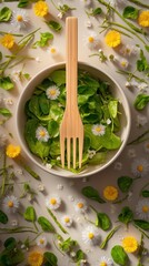 Fresh salad with greens and flowers in bowl