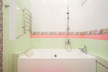 White whirlpool bath in the bathroom