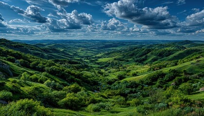 Obraz premium Lush valley panorama under a dramatic sky