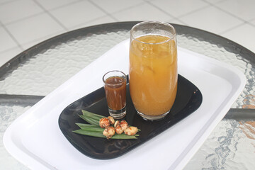 Traditional Indonesian Ginger Drink with Palm Sugar and Spices