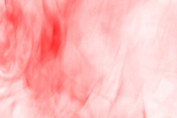 Abstract deep crimson red textured background with vertical streaks of light and shadow creating a...