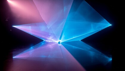 Fototapeta premium A futuristic laser light show with intersecting blue and pink beams reflecting on a surface.