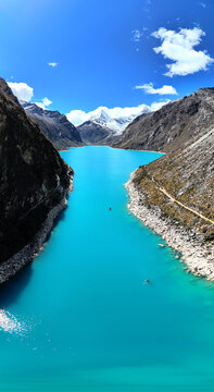 Laguna Paron in Peru is a mesmerizing turquoise lake in the Andes mountains, offering one of the most scenic and serene landscapes in South America. Beautifu Huascaran National Park Cordillera Blanca.