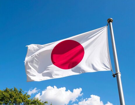 Japan's National Flag Against a Clear Blue Sky