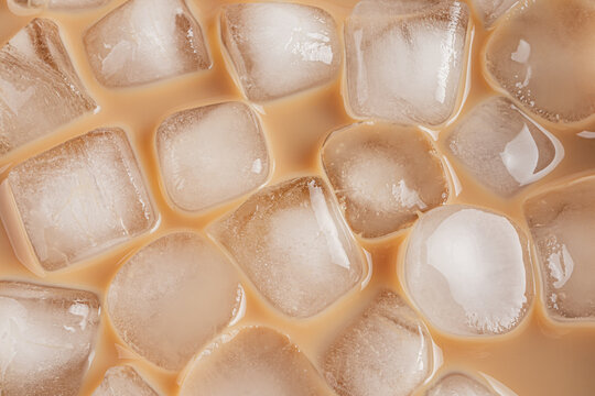Glass filled with iced cold brew coffee close-up