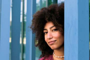 Portrait of a young Arab woman with curly hair