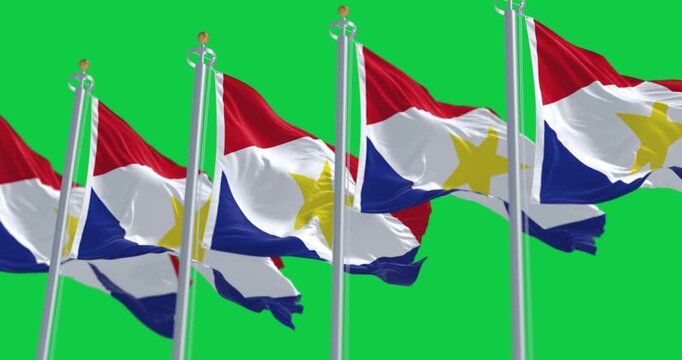 Flags of Saba waving in the wind isolated on green background
