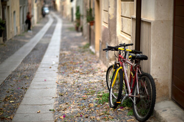 bicycle in the street, bicycles on the rampart promenade in Alghero Sardinia, Italy.