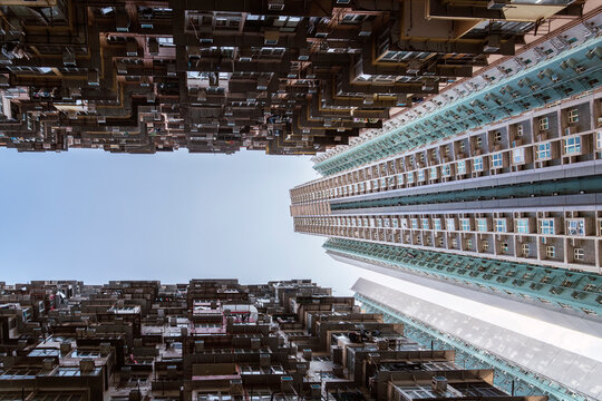 Vertical view of dense residential towers in Hong Kong